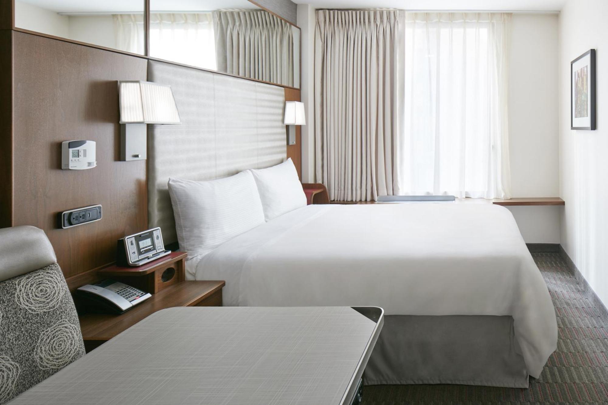 Petite Chambre Lit Queen-Size